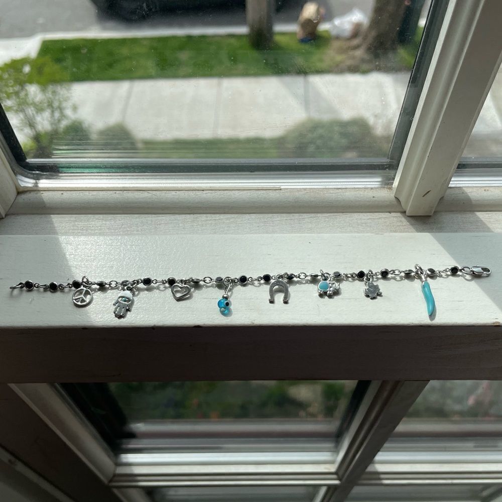 Cute silver bracelet with little charms